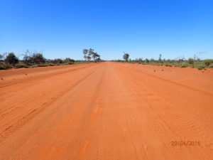 A typical red sand part of the Great Central Road - great if the dust isn't too deep. Be careful at the edges as the hard cap stops at the edge of the driving surface beyond which is deep, soft dust and down you go