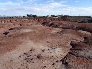 Old stockyards on an eroded dam bank at Lynhurst; used as part of the fence in the desert in the film "Rabbit proof fence"