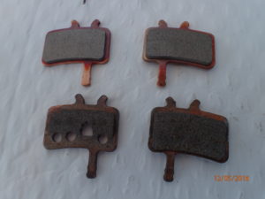 Wear to the front disc brake pads from two days of wet red sand