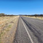 DAY 24 Tanami Tootle north from Yuendumu 87 km Don left his glasses at "Floodway" sign